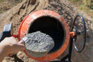 Filling An Orange Cement Mixer